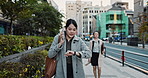 Japanese businesswoman, phone call and check time by run to work, late and meeting appointment in city. Young person, entrepreneur and cellphone with technology, watch and connection in urban town