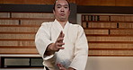 Aikido, student and practice martial arts, fight and pov of class in traditional gym. Japanese, fighter and man in competition with self defence, skill and learning action of fighting gesture
