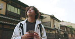 Japanese man, smartphone and travel in city with technology, gps and connection for destination directions. Young person, cellphone and mobile app in kyoto street and adventure on vacation in summer