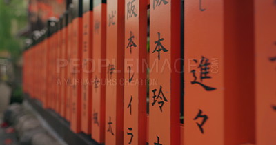 Japan, red pillar and writing for religion, shrine and Japanese ...