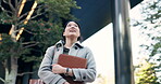 Businesswoman, japan and happy by office buildings in city, ambition and confident in corporate career. Person, thinking and formal clothes in professional job in tokyo town, outdoor and pride in cbd