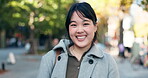 Japan businesswoman, face and happy in city for company travel and street for ambition or startup entrepreneur. Portrait, person and smile for summer trip for career growth and job pride in kyoto