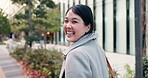 Walking, city and Japanese business woman with smile for morning commute, journey and travel to work. Professional, corporate and portrait of happy person in urban town for career, working and job