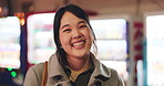 Laughing, face and confident businesswoman on lunch break in japanese town with vending machine technology. Person, portrait and happiness in professional career, funny joke and bokeh in tokyo city