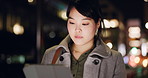 Business woman, city and tablet at night to scroll website, reading information and update app online. Japanese worker with digital software, social network or search internet in dark street of Tokyo