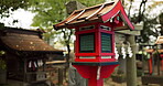 Japan, nature and wooden lantern in Kyoto with trees, tourist and woman with torii gate. Architecture, japanese culture and shinto shrine in woods with sculpture, religion memorial and monument