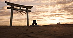 Torii gate, sunset sky in Japan and clouds with zen, spiritual history and travel adventure. Shinto architecture, Asian culture and calm nature on Japanese landscape with sacred monument at shrine