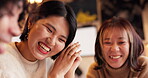 Japanese friends, laughing and talking in restaurant for dinner, vacation and hungry to order healthy food. Women, man or happy together on lunch in tokyo city or funny joke by bonding in coffee shop