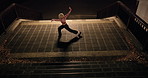 Japanese woman, city and dancing on stairs, moving body and freedom for street performance in night. Girl, dancer or person with art, concert and steps with creativity, vision and balance in Tokyo