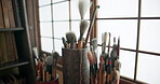 Paint brush, tools and cup for artist project product in tatami room for creativity, handmade business or hobby. Utensil, skill and studio professional or art process for diy, color craft or practice