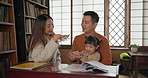 Japanese parents, child and learning with homework, dinosaur and books for game, development or helping hand. Dad, mother and daughter with toys, playing or check progress in family house with study