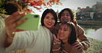 Selfie, travel and Asian friends at river with peace sign, holiday fun and students on happy adventure together with nature. Photography, man and women relax on outdoor group vacation at in Japan.