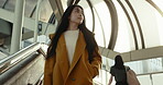 Japan woman, thinking and walking on staircase for travel adventure, city and journey with wellness. Person, thought and steps with commute in tokyo town, fashion clothes and positive on vacation