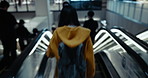 Timelapse, walking and woman in building for travel, commute and journey in Japan. Speed, motion blur and Japanese person at platform, location and escalator for train, public transport and station
