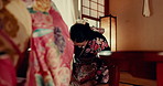 Hello, culture and Japanese women bowing in a temple for greeting, respect or conversation. Smile, support and people together for talking, traditional discussion or visit in a home with friends