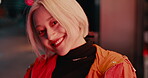 Woman, face and red light at night in city for Japanese adventure, explore travel or downtown evening. Female person, smile and creative urban fashion for trip celebration, dark street or late fun