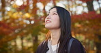 Thinking, outdoor and woman with nature, peace and Japan with fresh air, wind and college. Person, student and girl with trees, summer and adventure with journey, travel and explore with environment