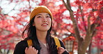 Thinking, outdoor and woman with a smile, nature and Japan with fresh air, wind and college. Person, peace and girl with trees, summer and adventure with journey, travel and environment with wonder