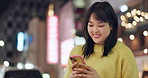 Smile, city and Japanese woman with smartphone, funny and connection with social media, influencer and post. Humor, person or girl with a cellphone, internet and online reading with joy and cheerful