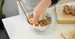 Ramen, Japan food and hands of person in kitchen for eating, meal preparation and cuisine. Home, cooking and closeup of egg and noodles for lunch, dinner and supper for wellness, diet and nutrition