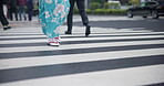 Japanese woman, feet and pedestrian crossing in kimono, city and walking for heritage celebration in streets. Person, setta sandals and traditional clothes in tokyo culture and wellness in fashion