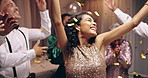 Business people, dancing and new year celebration with confetti at party, happy or excited in night. Men, women and smile with sparkle, gold and silver glitter for cheers at gala, fashion or friends