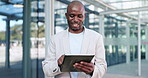 Black man, tablet and typing in city, commute and online, digital and technology. Working, cape town and busy in urban area, office buildings and businessman for networking and checking email