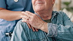 Man, hands and caregiver in elderly care, support or trust for healthcare, help or comfort at old age home. Closeup of female doctor or nurse touching person with a disability in wheelchair at house