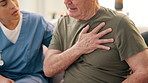 Hand on chest, heart attack and old man with caregiver for help, health and sick in nursing home. Indigestion, angina and hypertension with breathing, people and elderly care for medicine and support