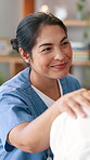 Nurse, patient and support hand on shoulder for consultation comfort for diagnosis, healthcare or advice. Asian person, smile and sick service job in clinic for helping with anxiety, pain or recovery