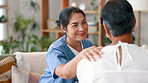 Touching, support or face of nurse with patient for healthcare, wellness or service in retirement. Smile, love or happy caregiver helping a senior female person on couch for medical advice or nursing