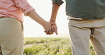 Outdoor, closeup and couple with love, holding hands and romance with nature, lens flare and romance. Unity, man and woman with sunshine, union and marriage with trust, relationship and summer break