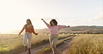 Dance, nature and woman friends on farm together for travel, adventure or exploration with energy. Earth, agriculture and dirt road with young people bonding in the countryside for summer vacation