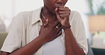 Chest pain, hands and woman coughing on sofa closeup with breathing, problem or panic attack at home. Zoom, flu and sick lady person in living room with lung massage for asthma, tuberculosis or cold
