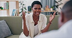 Couple, fight and angry on sofa with conflict, argument or disagreement for mistake, cheating and affair. African, people and divorce with crisis, frustration or fail marriage on couch in living room