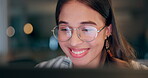 Business woman, reading with glasses and night research on computer for project, copywriting or editing report. Young editor or happy writer with screen reflection for analysis, news and editing