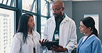 Teamwork, tablet or group of doctors in meeting planning a surgery strategy in collaboration together. Discussion, healthcare worksers or nurses speaking of online news reports, feedback or research 