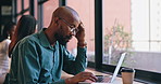 Business man, stress on laptop and cafe for remote work fail, mistake or news of bankruptcy. Tired African worker, freelancer or writer in pain, headache or fatigue typing on computer at coffee shop