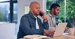 Laptop, phone call and planning with business man in office for research, communication or negotiation. Computer, internet and networking with startup employee speaking on mobile in workplace