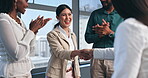 Business woman, handshake and meeting applause for partnership, onboarding and thank you or congratulations. People or employees shaking hands for deal, agreement and team clapping for promotion