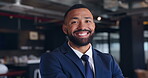 Businessman, face and arms crossed or happy in office with confidence and pride for professional career. Entrepreneur, person and portrait of employee with smile, formal outfit and cheerful at work 