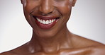 Black woman, teeth and smile for dental hygiene, skincare or cosmetics on a gray studio background. Closeup of African female person mouth for dentist, tooth whitening or oral and gum care treatment