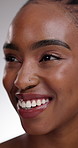 Black woman, teeth and dental hygiene in skincare or cosmetics on a gray studio background. Closeup of African female person, face and smile for tooth whitening, mouth or oral and gum care treatment