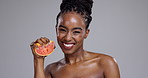 Skincare, wellness and face of black woman with grapefruit for beauty, cosmetics or benefits in studio. Dermatology, spa and portrait of person with fruit for natural, healthy skin on gray background