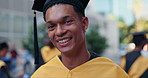 Face, outdoor and man with graduation, education and university with success, achievement and college. Portrait, student and person with smile, event or celebration with scholarship, goals or academy