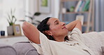 Woman, breathe and relaxing at home on weekend, comfortable and eyes closed for sleeping on couch. Female person, resting and dreaming in nap, calm and peaceful in living room and mindfulness for zen