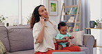 Mother, phone call and freelancer networking with baby, communication and childcare at home. Mommy, multitasking and communication on technology, conversation and comforting child in living room