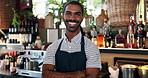 Welcome, coffee shop and confident portrait of man at bar with smile, waiter or manager at restaurant startup. Bistro, service barman and happy small business owner at cafe counter with arms crossed.