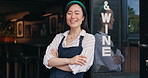 Happy asian woman, cafe and small business owner by door in confidence for management. Portrait of young female person or waitress smile with arms crossed by professional restaurant or coffee shop