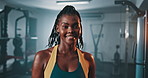 Gym, face and happy black woman confident in club, muscle building or strength exercise for fitness development. Commitment, portrait and African bodybuilder smile for workout, training and challenge